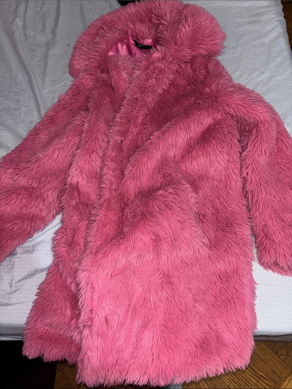 Woman plush pink fur coat